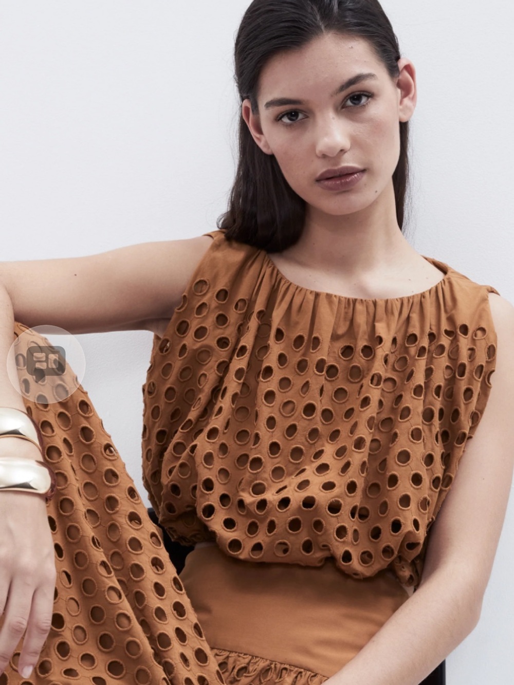 Unison sleeveless cutout crop top
